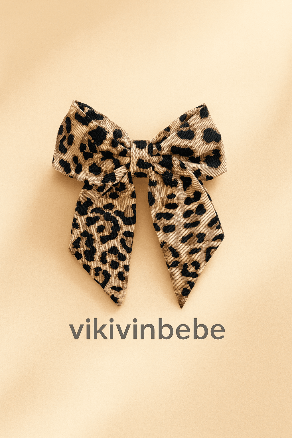 Leopar desenli büyük fiyonk toka, önden görünüm